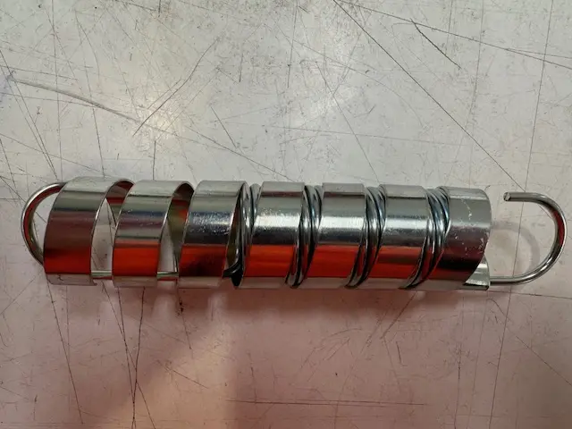 CLUTCH SLAVE RETURN SPRING